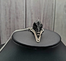 Load image into Gallery viewer, Hand carved Raven&#39;s Skull Pierced pendent set in Sterling Sliver w/18 inch Sterling Silver Chain
